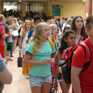 Photo of students entering a middle school